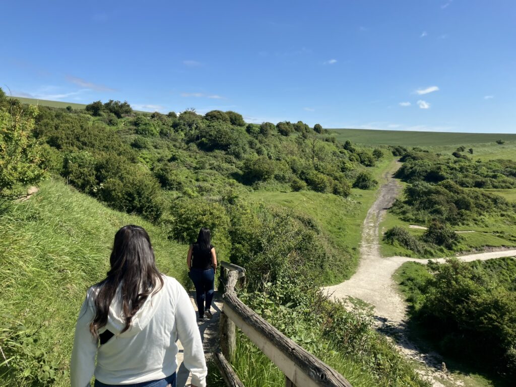 Two people walking in Dover.