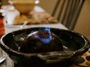 A Christmas pudding on a plate