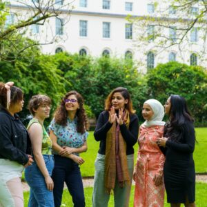 A group of people having conversations