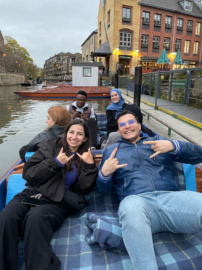 Group of Friends punting in Cambridge.