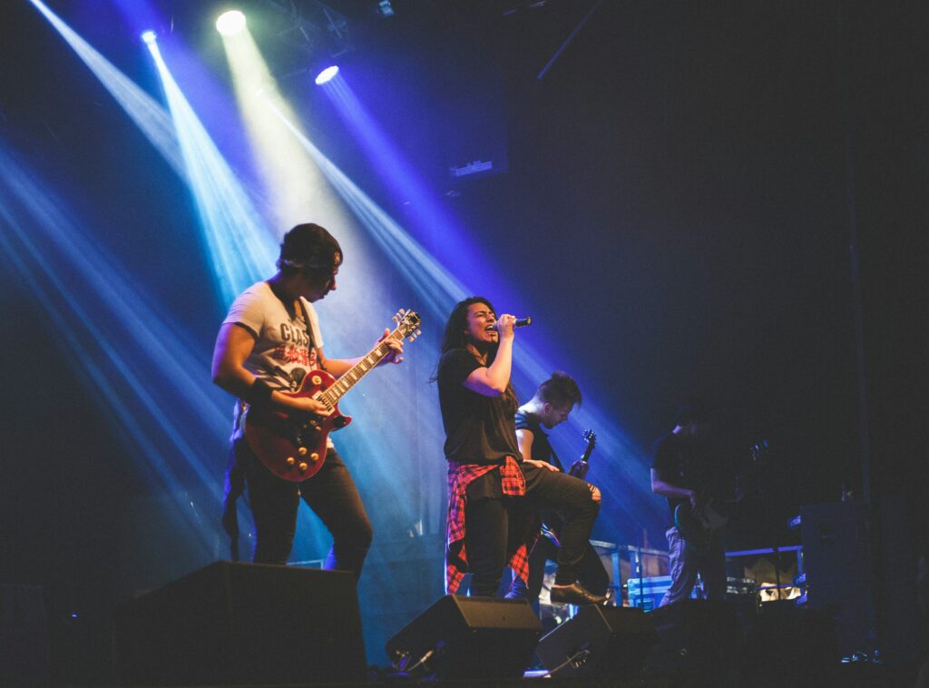 A band singing on stage 