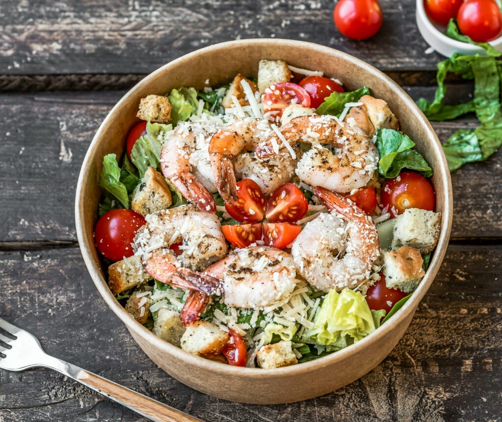 A bowl of shrimp salad 