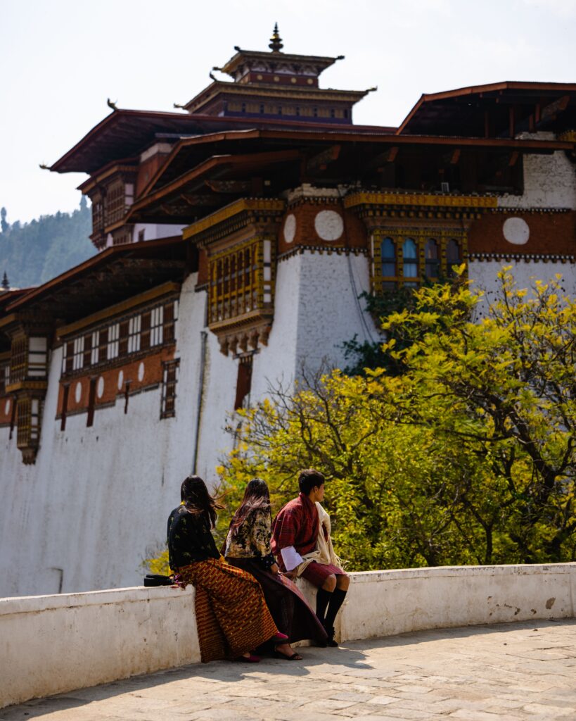 Bhutanese worshipers at the annual Tshechu festival in Punakha, Bhutan