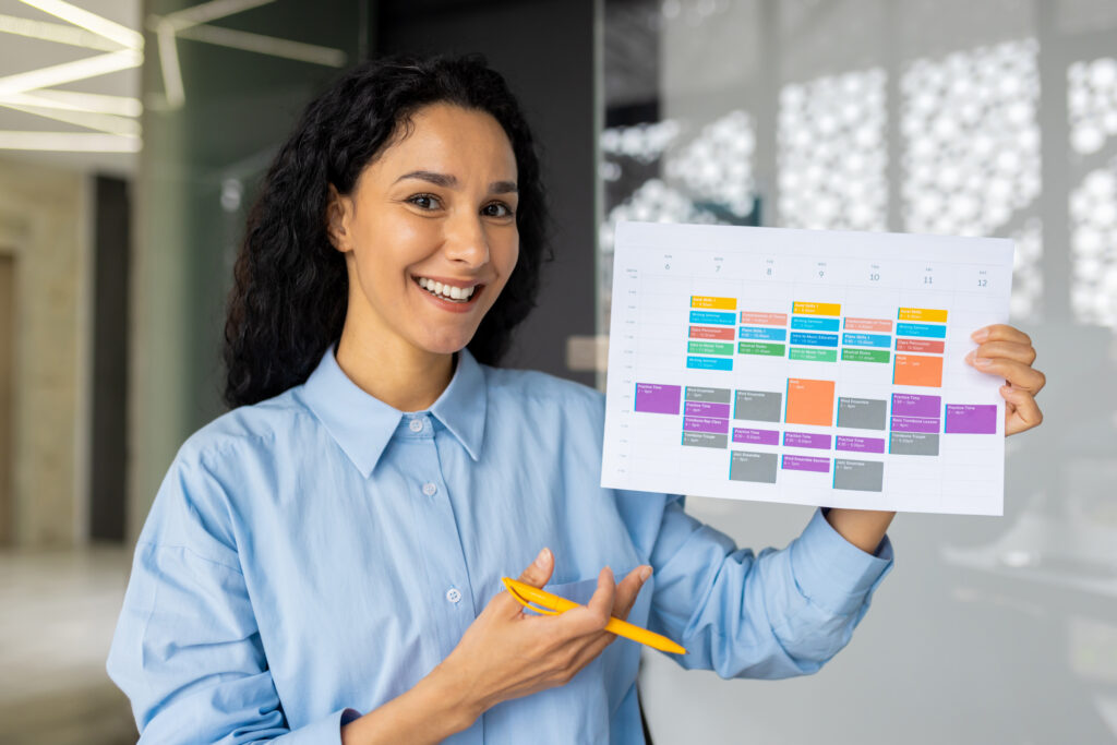 Online presentation, video call, remote conversation with partners, colleagues, businesswoman smiles and looks at camera, shows report with tables, talking new startup, view of a web camera.